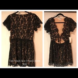 Toni black lace v-back dress. Size M